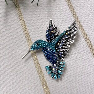 Brooch- Hummingbird, NIP, deep silvery base, blue & teal rhinestones, 2x2”, case